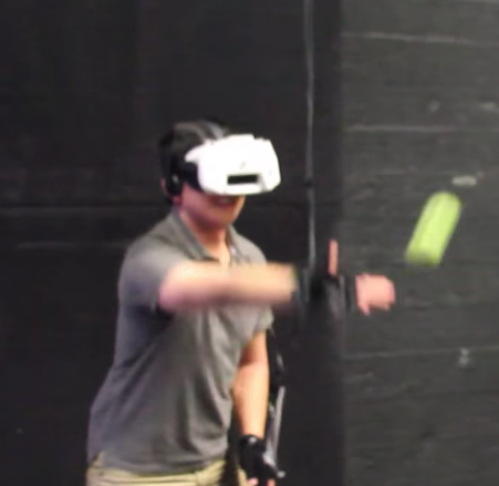 Catching a Real Ball in Virtual Reality